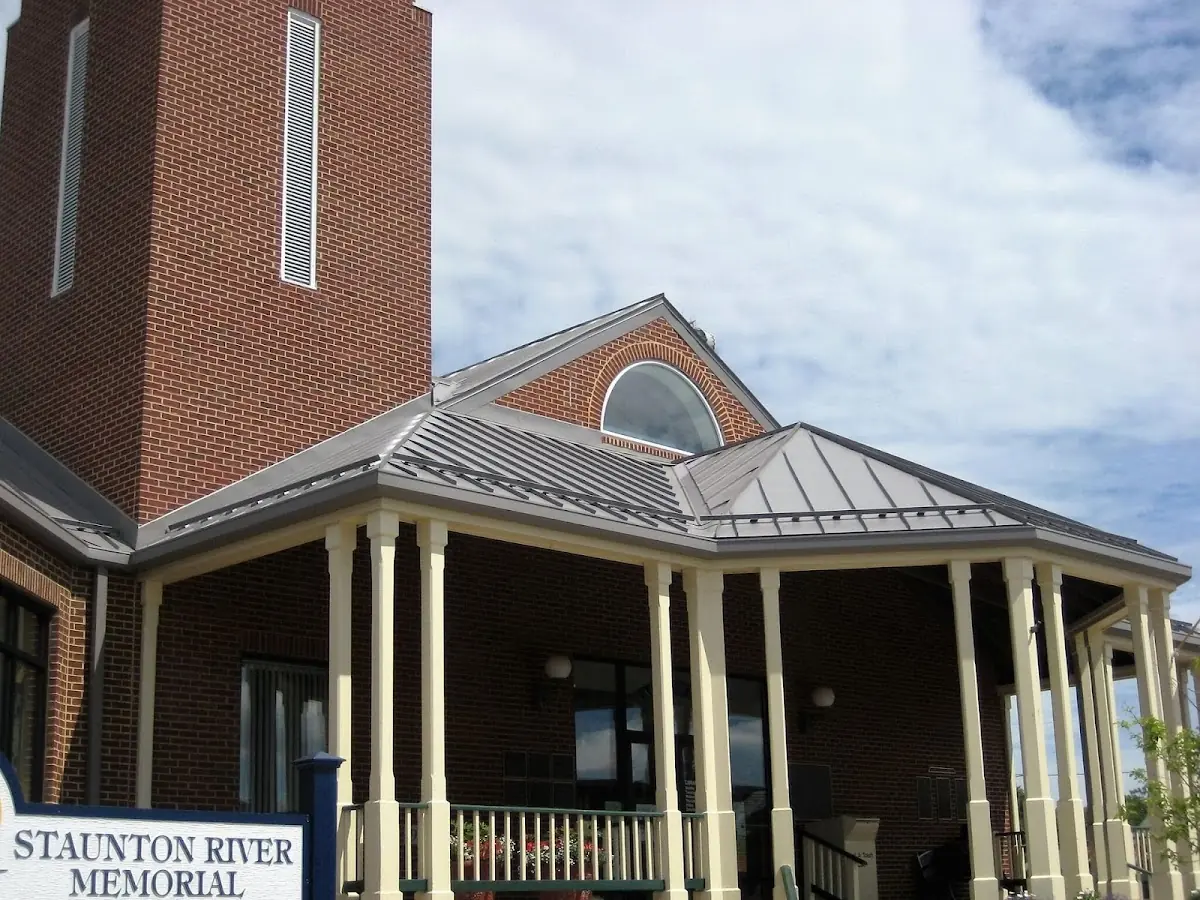 Skilled roofing craftsmen working on a residential roof in Colorado City